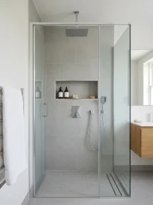 Built-in shower niches saving space and organizing items