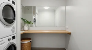 Mirror making a narrow laundry room appear larger