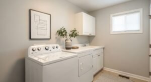 Laundry room decorated with simple wall art
