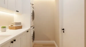 Light-colored narrow laundry room that feels open and airy