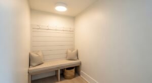 Small mudroom corner setup with compact storage