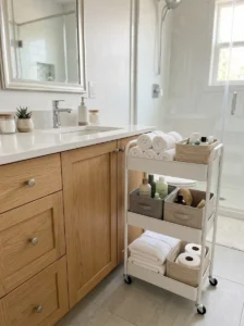 Slim rolling cart storage in small bathroom