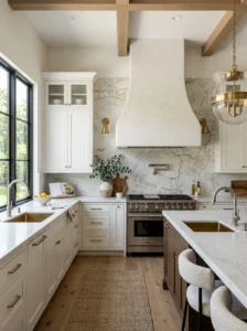 Alt Text: Open kitchen with a decorative statement range hood.