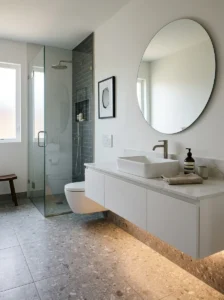 Floating white vanity in a modern bathroom.