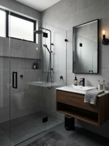 Gray bathroom with black modern accents.