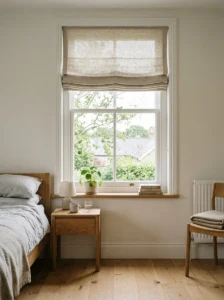 Minimalist nightstand with a single framed photograph.