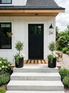 Small front porch featuring a stylish statement doormat.