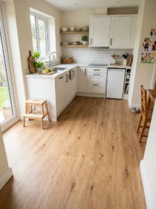 Budget-friendly kitchen with realistic light wood-look sheet vinyl flooring.