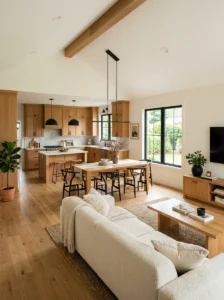 Open concept home with matching oak cabinetry and furniture throughout.