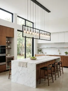 Modern linear chandelier above a kitchen island.