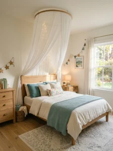 Girls bedroom with a sheer canopy creating a whimsical cozy bed area.
