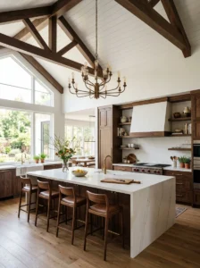 Large multi-light chandelier above a kitchen island.