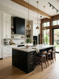Matte black kitchen island with warm white cabinets