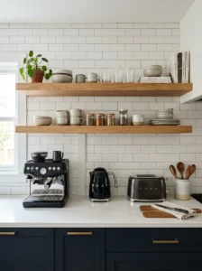 Kitchen shelving with hidden appliance cord management.