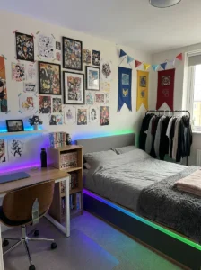 Anime bedroom feature wall decorated with removable washi tape and artwork.