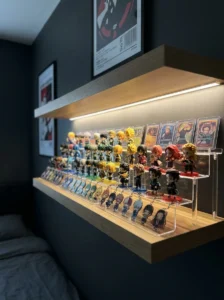 Small anime collectibles neatly arranged on acrylic display stands.