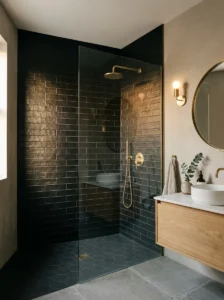 Textured matte dark tile creating depth in a modern bathroom