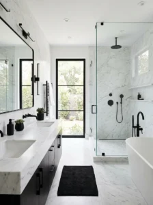 Matte black bathroom fixtures contrasted with light marble surfaces