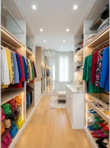 Daylight-balanced LED lighting in an organized walk-in closet.