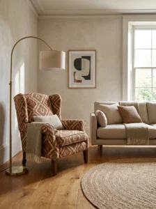 Modern upholstered wingback chair adding classic character to a living room.