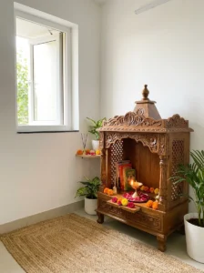 Small window providing natural light and ventilation in a pooja room