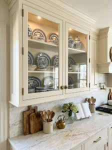 Glass-front kitchen cabinets displaying elegant heirloom china