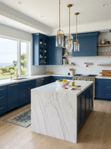 Blue kitchen cabinets with elegant white marble countertops