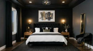 Luxury black bedroom with velvet bed, warm lighting, and stylish decor.